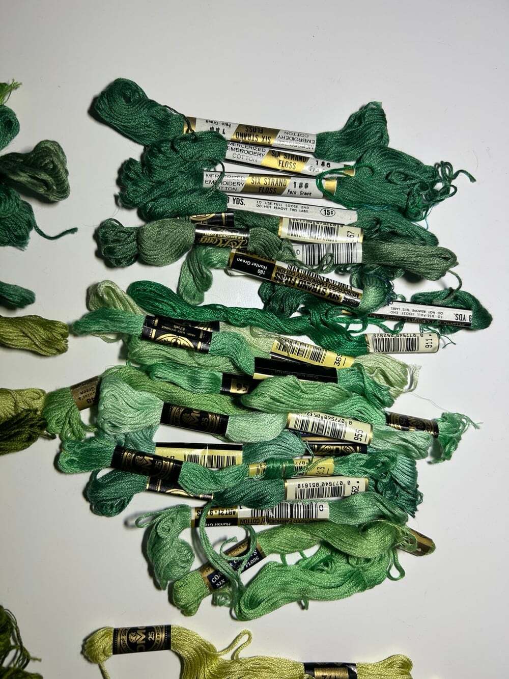 64 Skeins of assorted embroidery threads DMC and other Shades of green bargain!